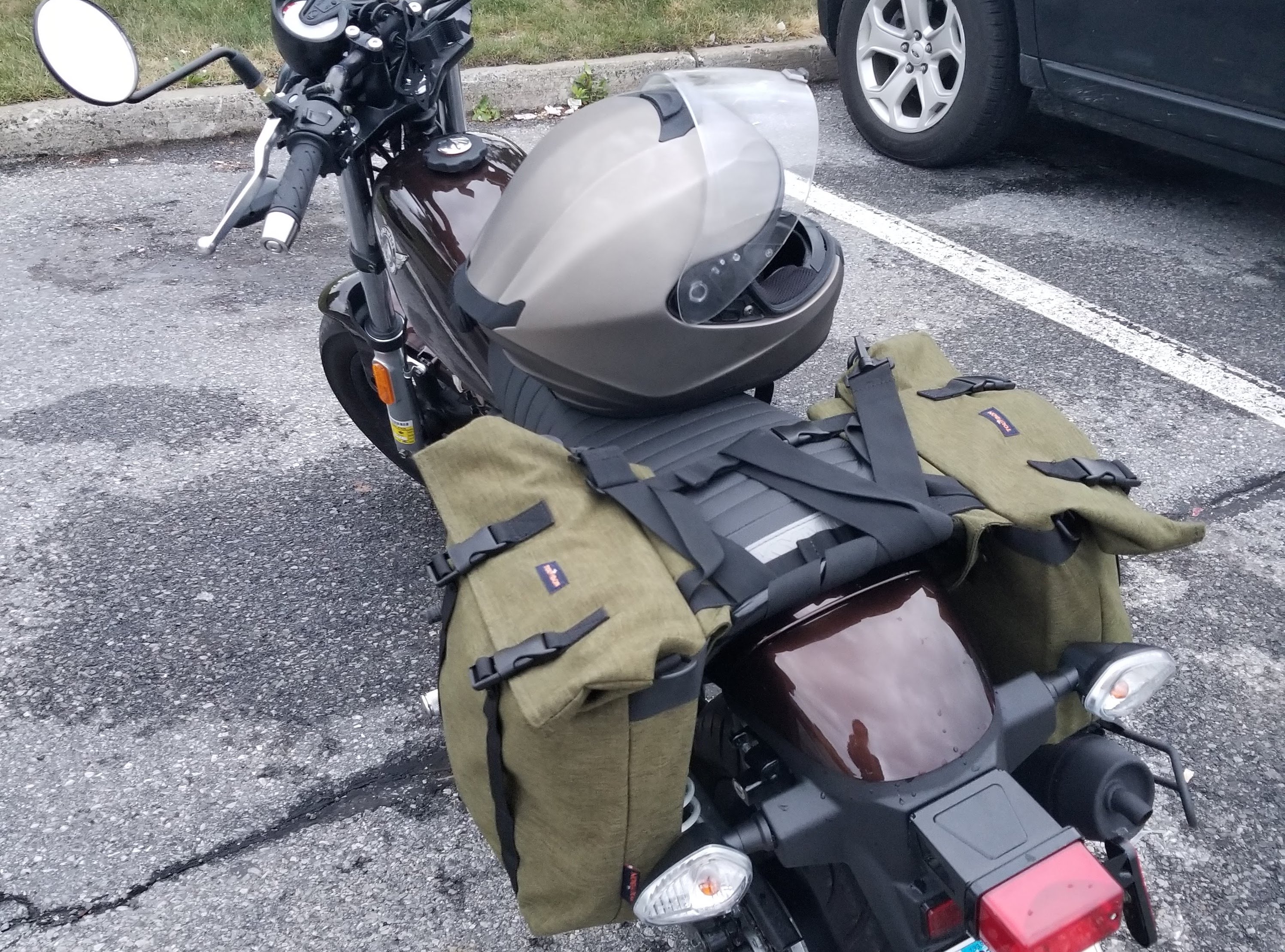 bags strapped to motorcycle
